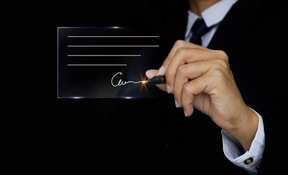 Electronic Signature Concept, Electronic Signing Businessman signs electronic documents on digital documents on virtual screen using stylus pen. photo