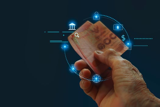 Hand of an elderly person handing a banknote photo
