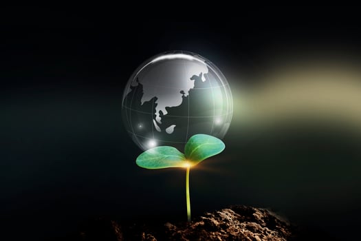 Environment, eco and energy saving concept. Energy resources crystal earth on sunny background. photo