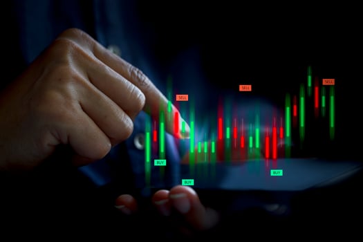 Businessman Hand touching smartphone with virtual increasing technical graph photo
