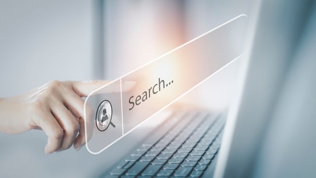 search button on laptop screen photo