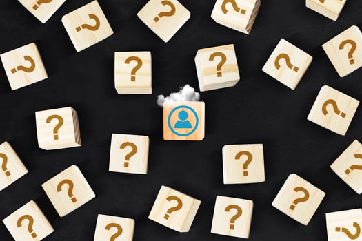 a box with question marks and a cloud photo