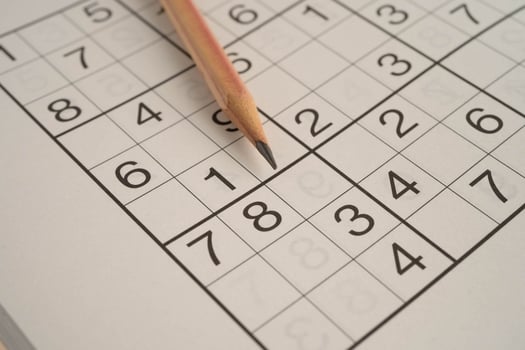 Sudoku puzzle, game to play for keep you brain younger for developing Alzheimer disease in senior patient. photo
