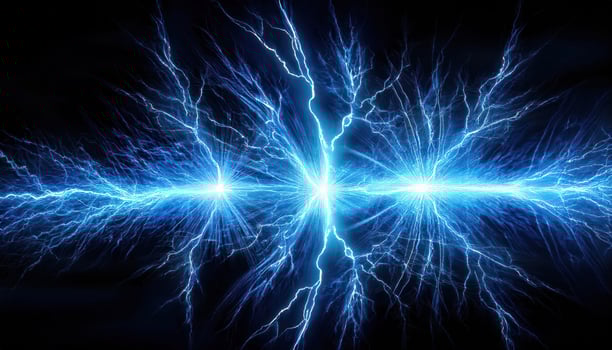Intense vibrant blue lightning bolts in dark night sky photo