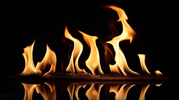 A fire is burning in the dark photo