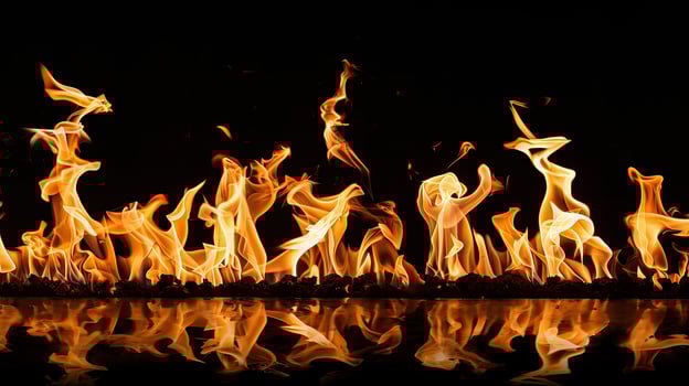 A fire is burning in the dark photo