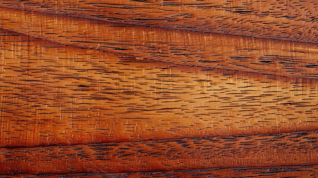 A close up of a wood surface with a dark stain photo
