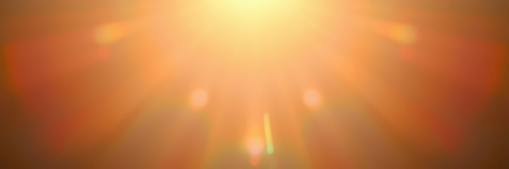 Bright sunlight over a landscape creating a warm and inviting atmosphere during golden hour photo