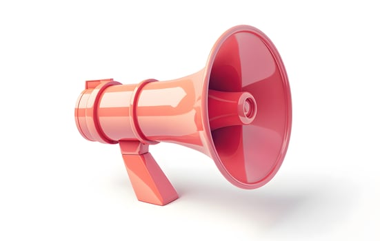 A red megaphone, made of plastic and metal, rests on a white surface photo