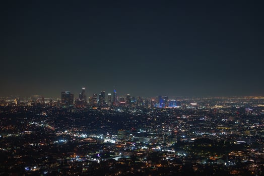 Nighttime View of Illuminated Los Angeles Skyline from Elevated Vantage photo