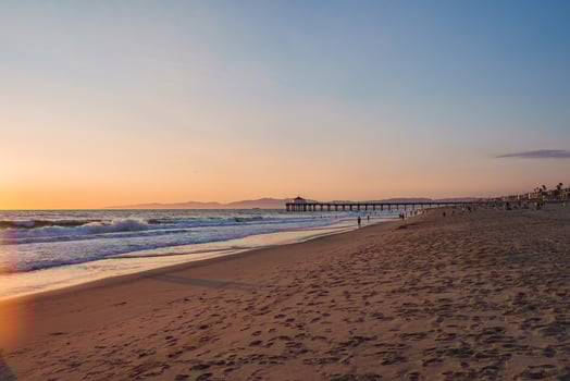 Sunset at Manhattan Beach Pier with Silhouetted Ocean View photo