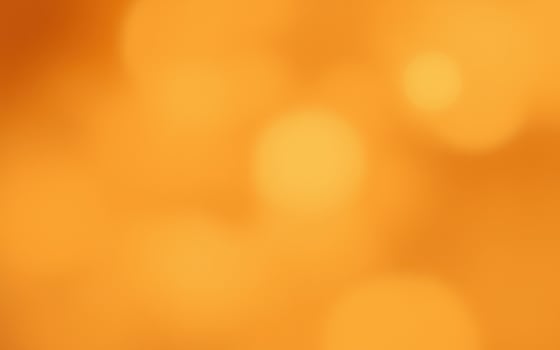 Warm golden bokeh background creates a cozy atmosphere for autumn-themed celebrations and events photo