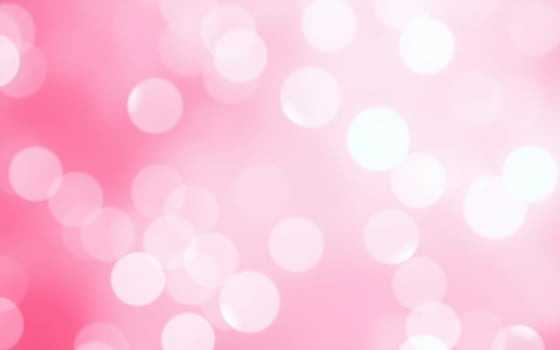 Soft pink bokeh background creating a dreamy and whimsical atmosphere perfect for celebrations and design photo