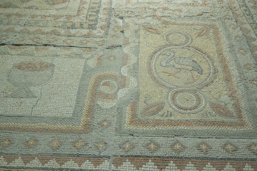 Floor mosaics from Byzantine times VI AD. They depicting walking birds, geometric ornaments and stylized fruits. Authors are unknown photo