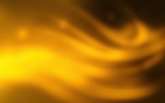 Warm golden waves of light create a mesmerizing abstract display during a serene evening atmosphere photo