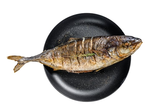 Grilled teriyaki flavored Yellowtail, Japanese amberjack in a pan. Isolate, white background. photo