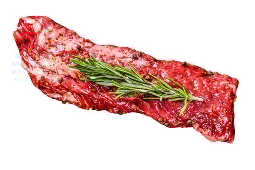 Raw skirt, machete steak in a pan with cooking ingredients. Isolated on white background. Top view. photo