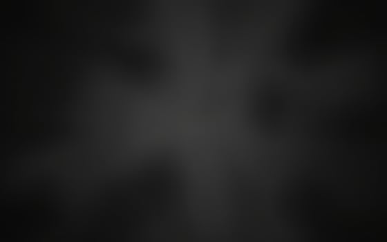 Abstract dark texture with soft light patterns creating a mysterious atmosphere photo
