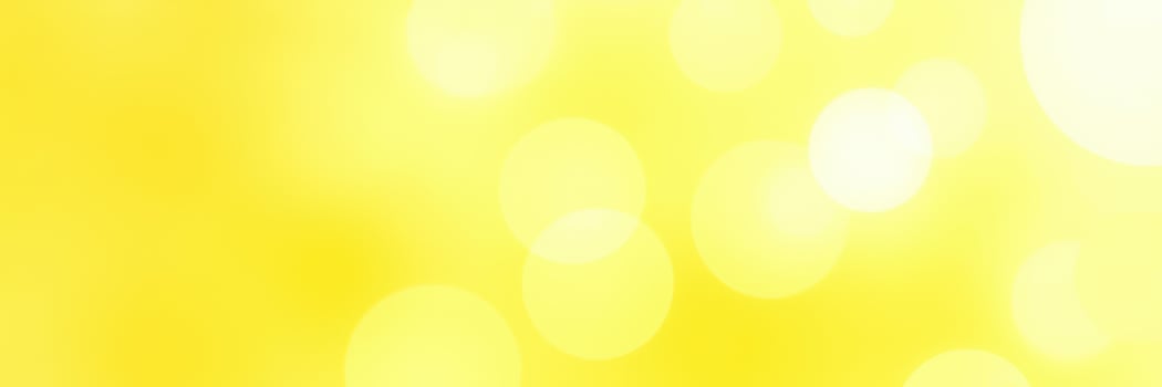 Bright abstract background with soft yellow bokeh lights creating a warm and inviting atmosphere photo