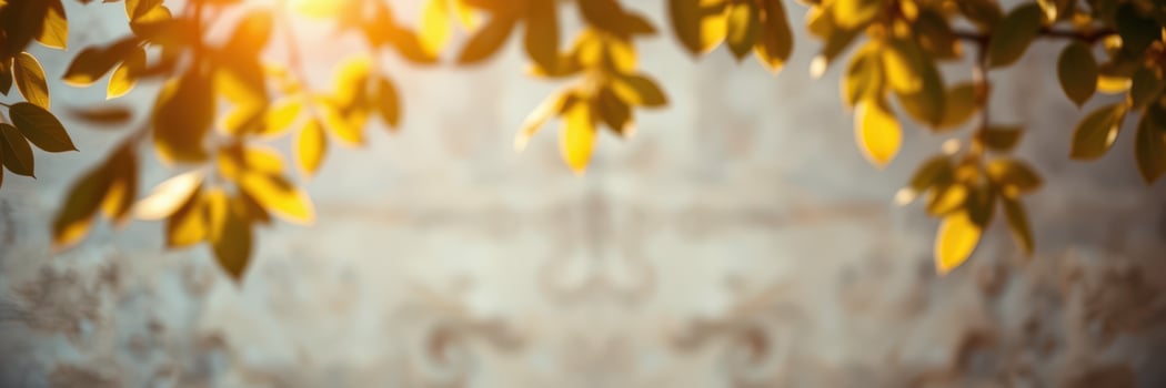 Golden leaves swaying gently in the breeze during a tranquil afternoon in a serene outdoor setting photo