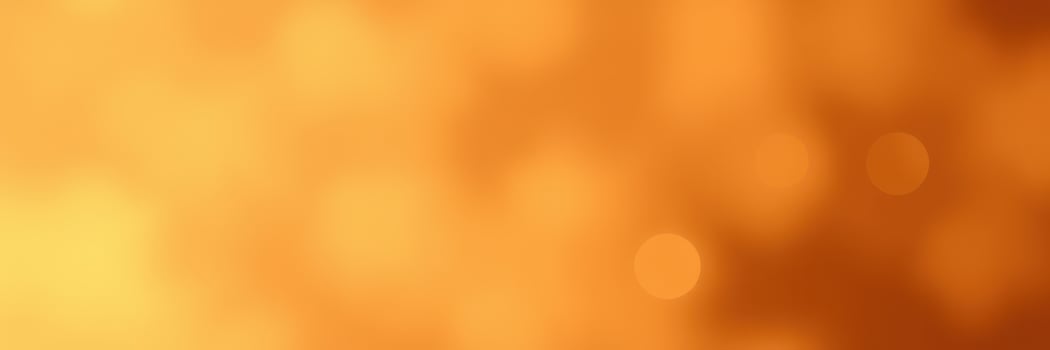 Bright orange abstract background with soft bokeh effects creating a warm and inviting atmosphere for creative designs photo