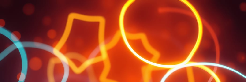 Colorful light patterns swirl against a vibrant background in a night setting showcasing dynamic motion and energy photo