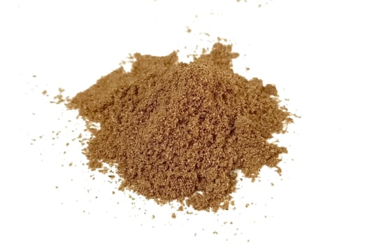 Coriander powder isolated on white background photo