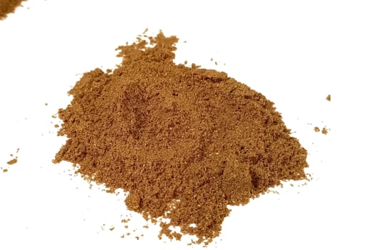 Coriander powder isolated on white background photo