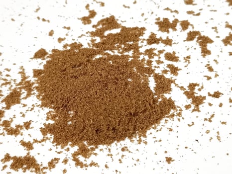 Coriander powder isolated on white background photo