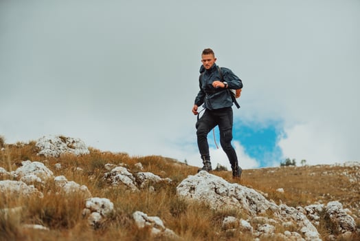 A hiker man hiking trail mountain, sport outdoor. photo