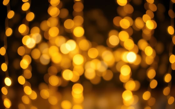 Golden bokeh lights create a warm and festive atmosphere for celebrations and events in a cozy indoor setting photo