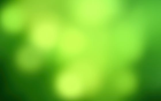 Vibrant green abstract background with soft bokeh effect in a natural setting photo
