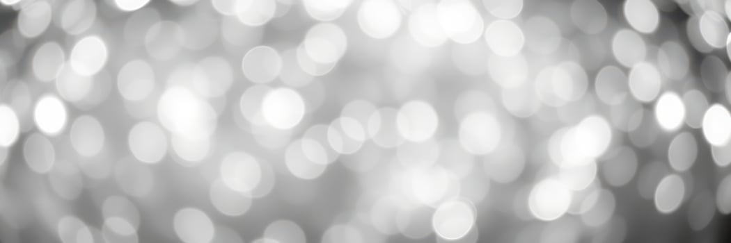 Soft bokeh background with sparkling light effects creating a dreamy atmosphere for artistic purposes photo