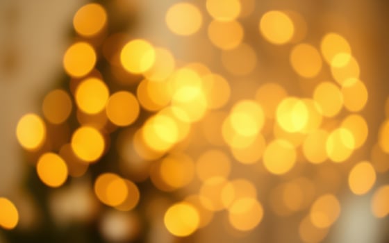 Soft golden lights create a warm atmosphere of joy and celebration during the holiday season photo