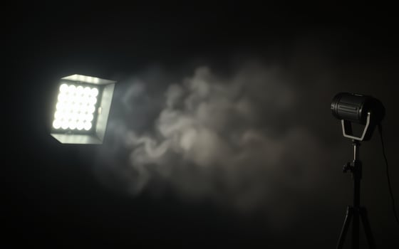 Bright light illuminates a mysterious atmosphere with smoke effects in a dark space photo