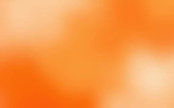 Abstract gradient background in vibrant orange tones for creative design photo