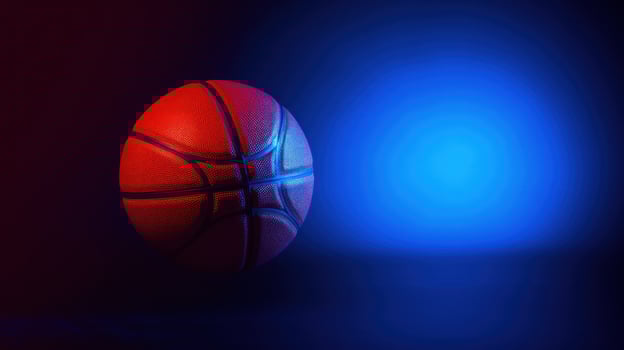 Glowing basketball on dark background photo