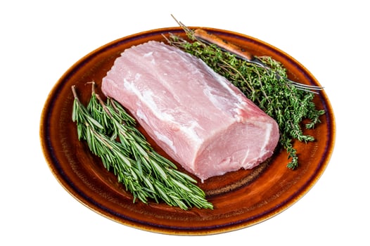 Fresh Raw pork loin meat with thyme and rosemary on rustic plate. Isolated on white background. photo