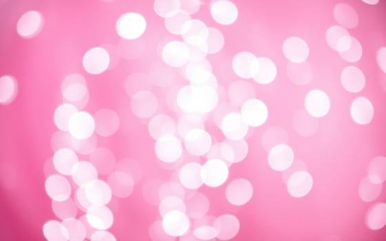 Colorful bokeh lights create a vibrant atmosphere for a celebration or event photo