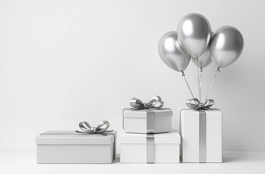 Gifts in silver and white packaging with bows photo