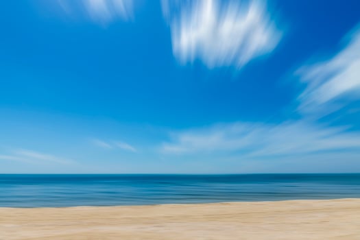Motion of the sky and sea with soft white clouds. photo
