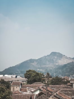 A view of the mountains from a rooftop photo