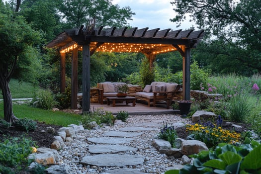 Cozy pergola lighting up tranquil backyard garden in twilight photo