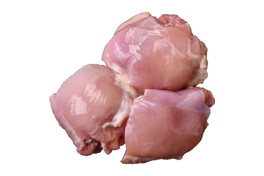 Fresh raw chicken thigh fillets with salt, spices and herbs photo