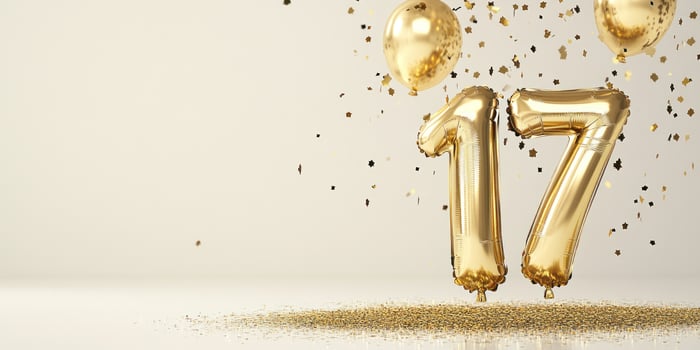Festive gold number 17 balloon celebration with confetti photo