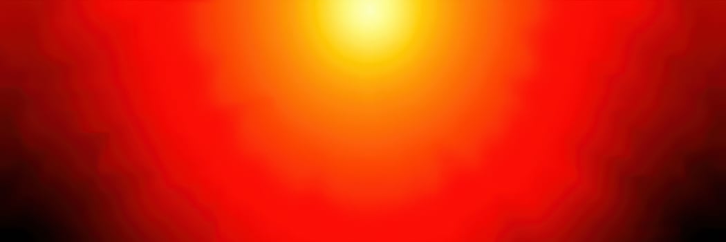 Vibrant sunset casting warm hues over the horizon with orange and yellow tones illuminating the sky photo