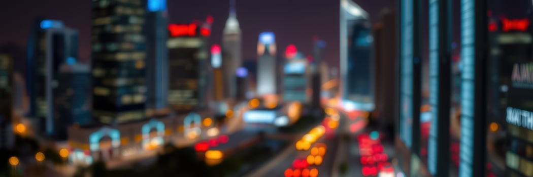 City skyline illuminated at night showcasing vibrant lights and bustling activity photo
