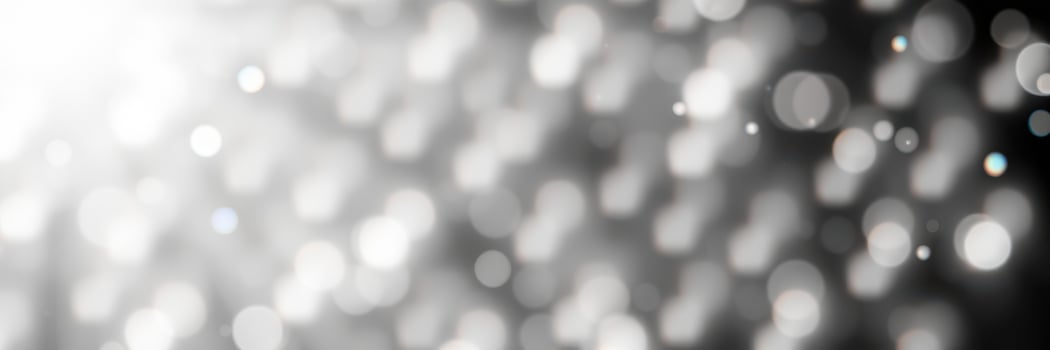 Light reflections create a shimmering effect on a dark background in a creative artistic display photo