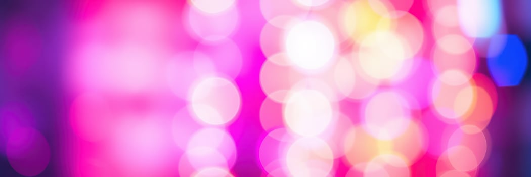 Colorful abstract lights create a vibrant atmosphere in a nightlife setting during an evening event photo