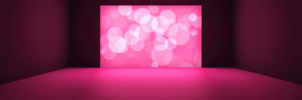 Colorful pink backdrop with soft bokeh lights creates an inviting atmosphere for artistic events photo